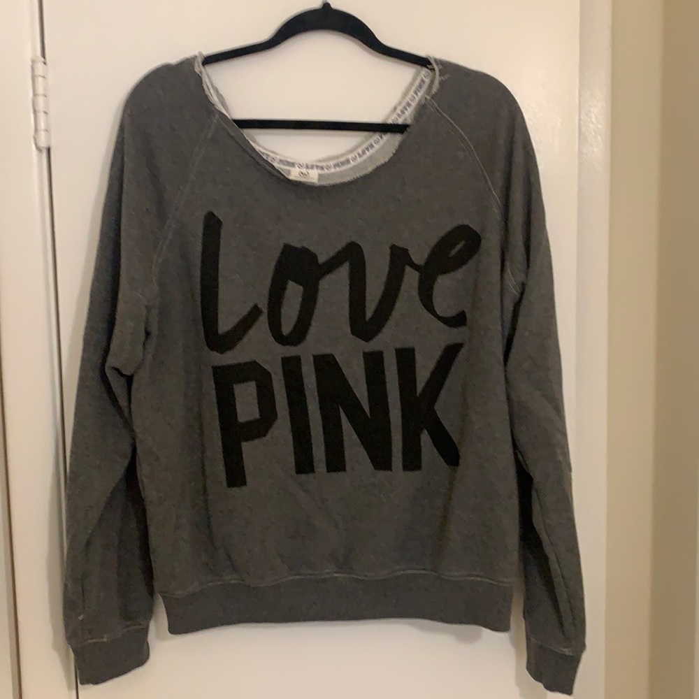 Victoria’s Secret pink sweatshirt with raw hem neckline. Never worn